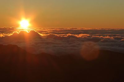 Scenic view of dramatic sky during sunset