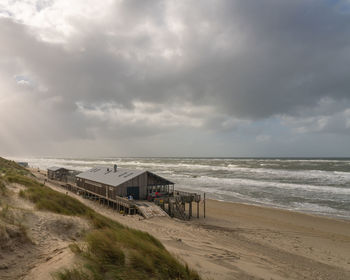 Scenic view of beach against sky