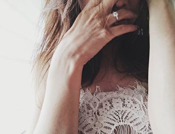 Midsection of woman at home