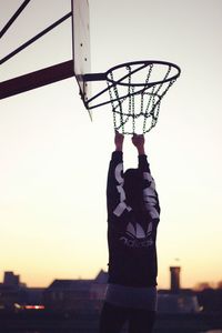 Low angle view of basketball hoop against sky