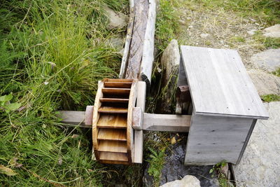 High angle view of bench in park