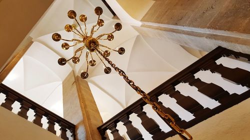 Low angle view of illuminated chandelier