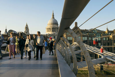 Group of people walking in building