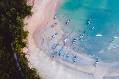 Aerial view of boats moored on beach