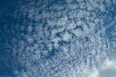 Low angle view of clouds in blue sky