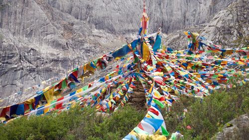 Colorful umbrellas against sky