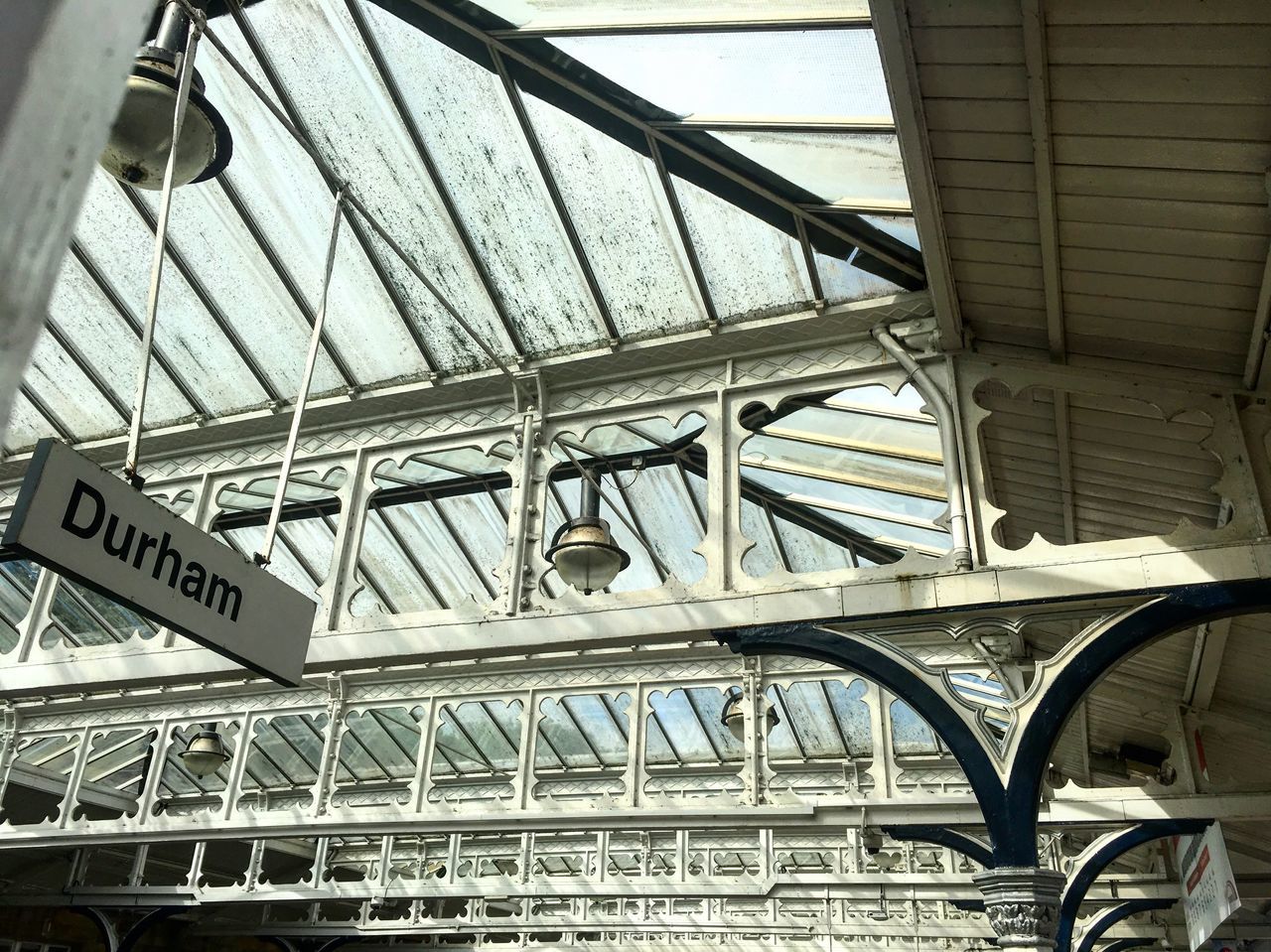 LOW ANGLE VIEW OF INFORMATION SIGN ON BRIDGE