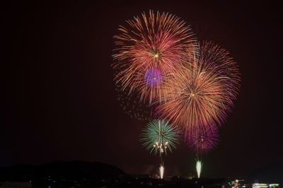 Firework display at night