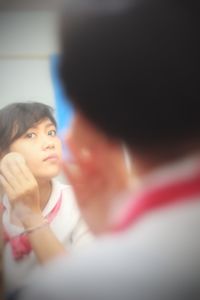 Portrait of a serious young woman looking away