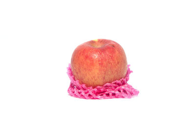Close-up of apple against white background