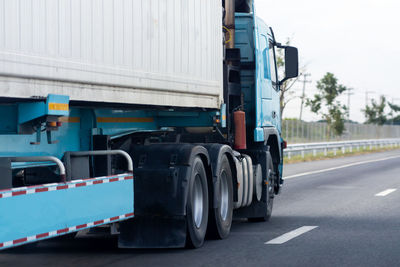 View of truck on road in city