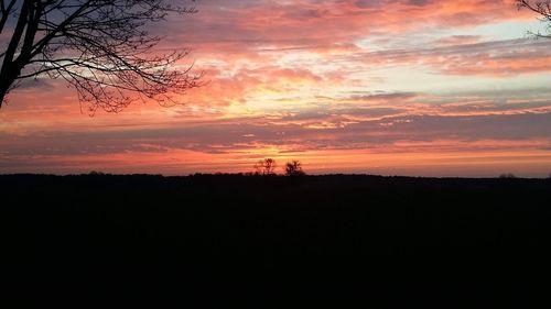 Scenic view of dramatic sky during sunset