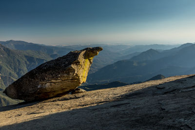 Scenic view of mountains and a rock against sky in the sequoia national park