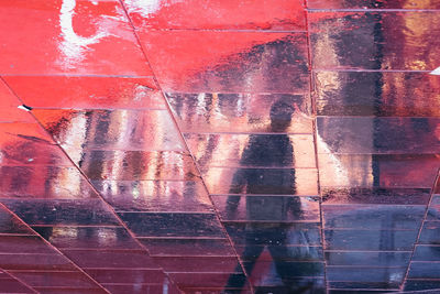 Full frame shot of wet glass wall