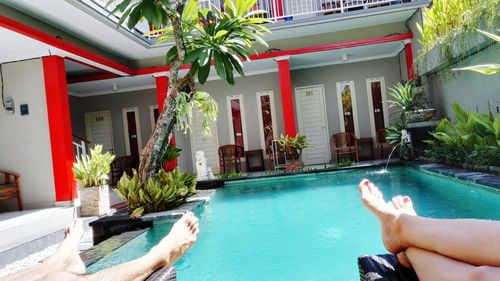 Man relaxing in swimming pool