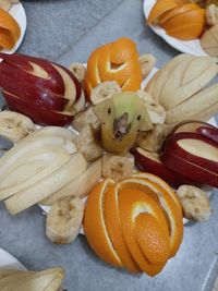 High angle view of orange fruits in container