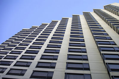 Low angle view of modern building against clear sky