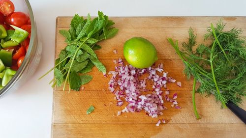 High angle view of chopped vegetables on cutting board