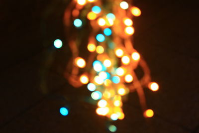 Defocused image of illuminated lights at night