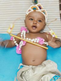 An indian kid become a little krishna during the festival