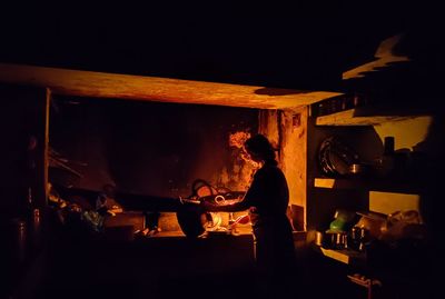People working on display at night