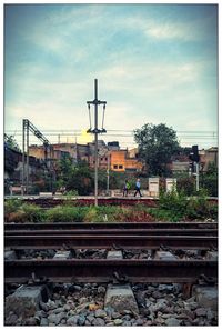 Railroad tracks against sky