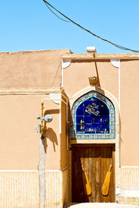 Low angle view of ornate building against clear sky