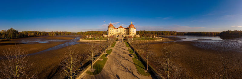 View of buildings at riverbank