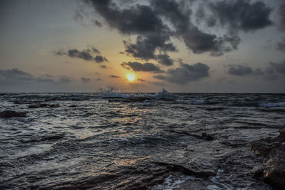 Scenic view of sea against sky during sunset