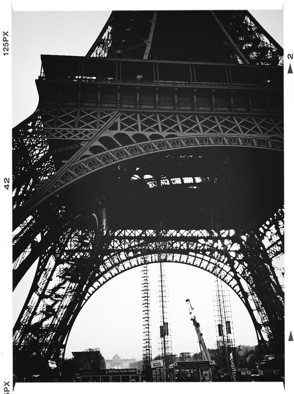 architecture, built structure, low angle view, famous place, transfer print, travel destinations, international landmark, metal, capital cities, tourism, eiffel tower, bridge - man made structure, travel, engineering, auto post production filter, building exterior, connection, tower, culture, arch