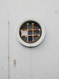 Low angle view of window on wall