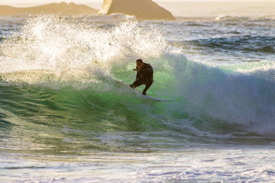 Man surfing in sea