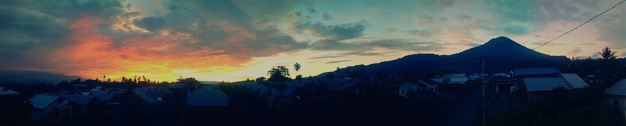 Scenic view of cloudy sky at sunset