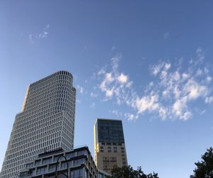 Low angle view of skyscrapers against sky