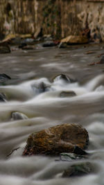 Close-up of water flowing over rocks