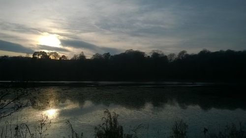View of lake against cloudy sky