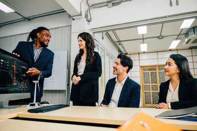 Business colleagues working in office