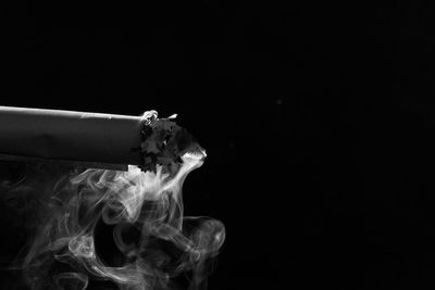 Close-up of smoke against black background