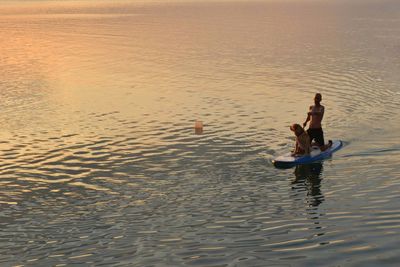 Full length of men in sea