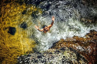 High angle view of woman in water