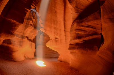 Low angle view of illuminated rock formation