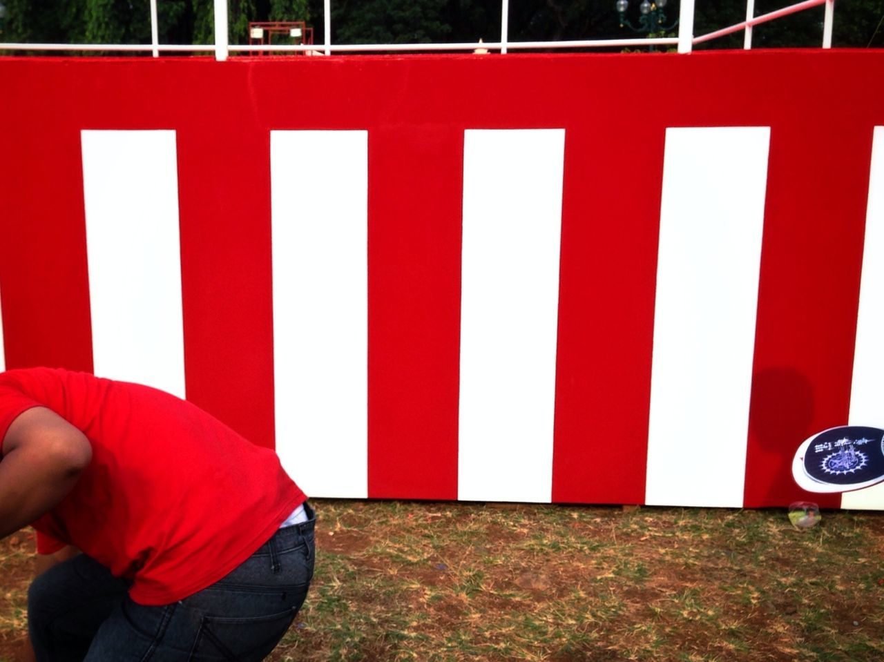 red, communication, text, western script, safety, protection, men, lifestyles, day, sign, guidance, rear view, indoors, standing, close-up, patriotism, striped, leisure activity