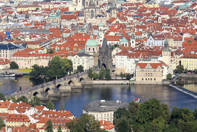 High angle view of city by river