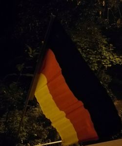 High angle view of multi colored flag on road