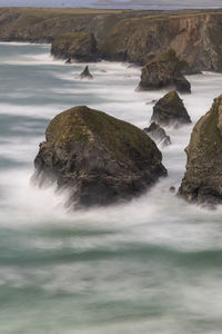 Scenic view of rocks in sea