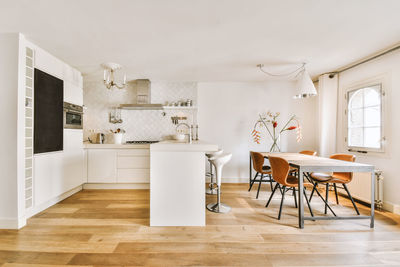 Empty chairs and table at home