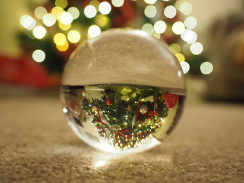 Close-up of crystal ball on table