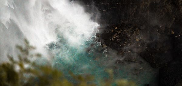 Full frame shot of water flowing through rocks