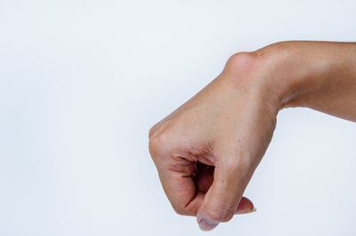 Midsection of person against white background