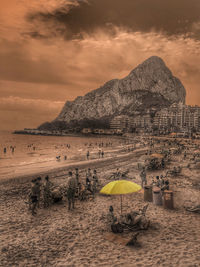 Scenic view of beach against sky during sunset